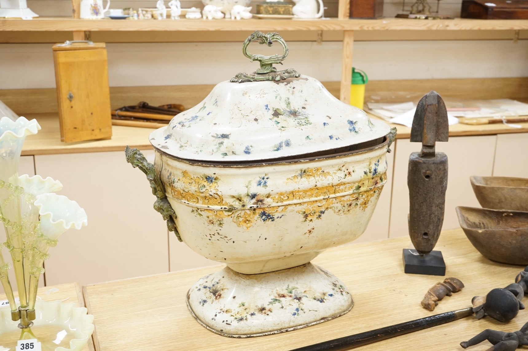 A 19th century painted toleware log box and cover hand painted with flowers, 58cm wide